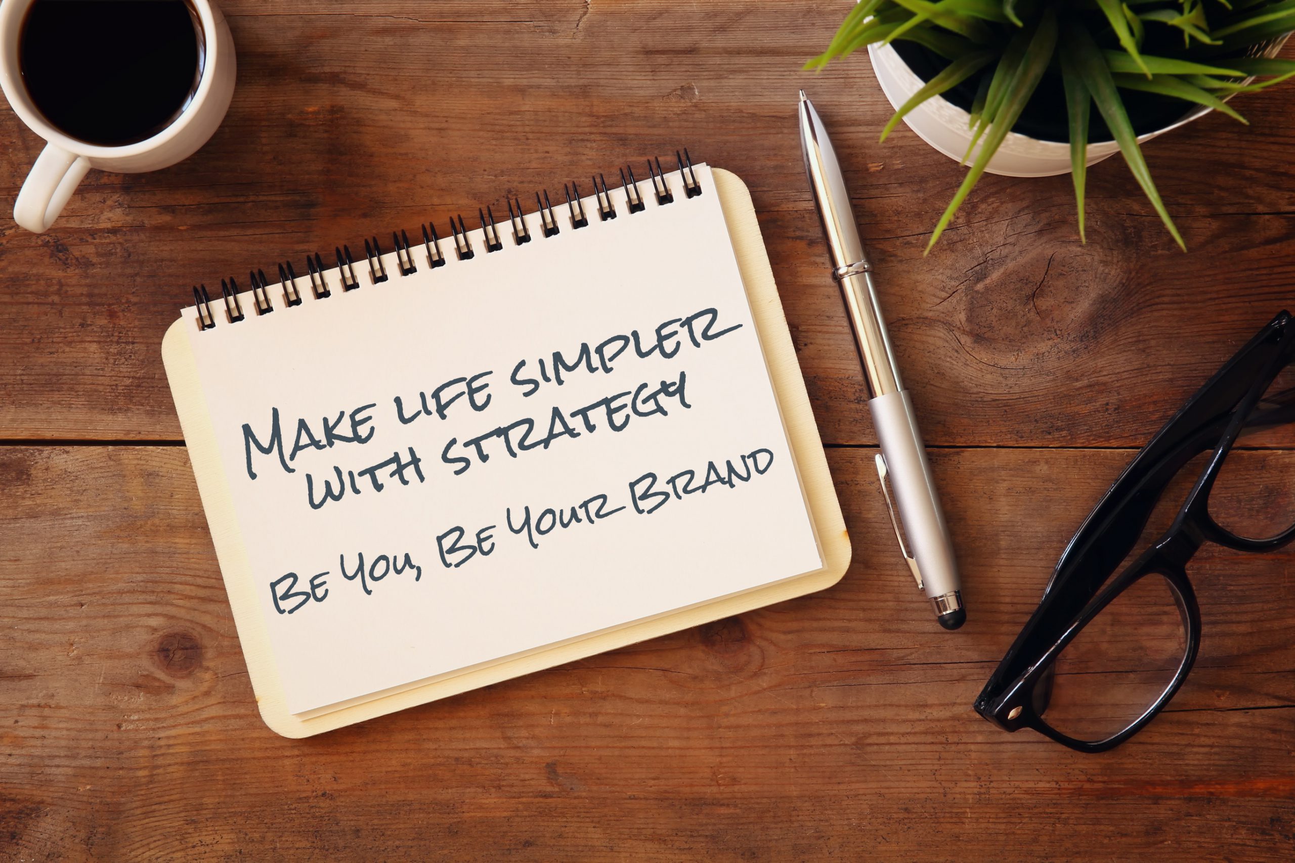 note book that reads make life simpler with strategy